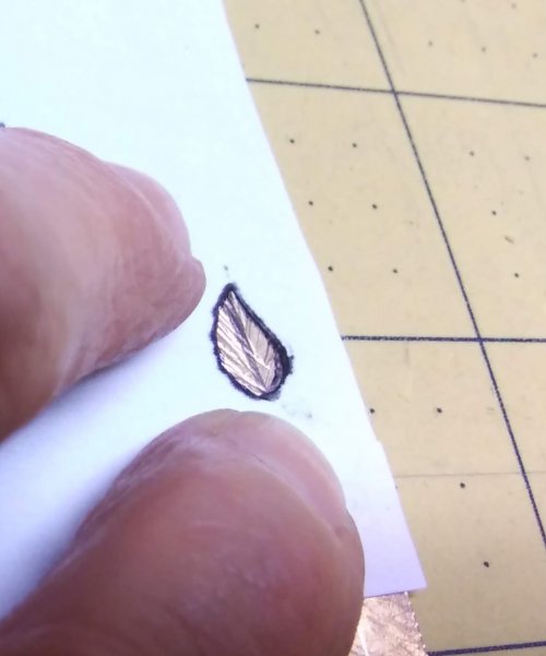 Judy Larson's Making TIny Leaves - , Metalwork, Cutting, Cutting Tool, Cutters, Texturing, Place the template on the textured scrap